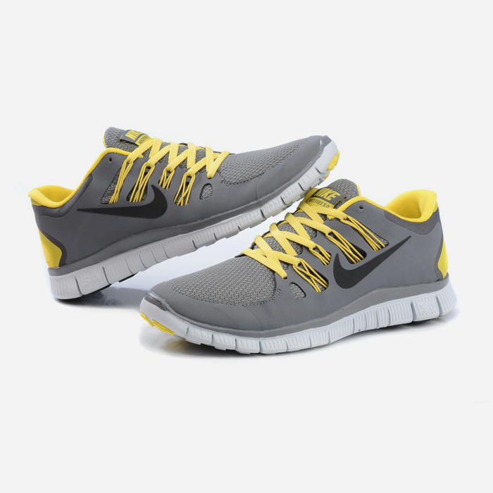 Nike grey hotsell and yellow shoes